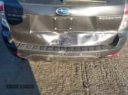 ✅ 2010 Subaru Forester X • VIN: JF2SH6BC0AH794689 • Lot: 43601933. Listed on IAAI with 140,848 mi. Free auction sales archive from the USA and detailed vehicle history report at DreamBid. Image 6.