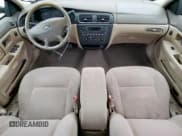 ✅ 2001 Ford Taurus LX • VIN: 1FAFP52U41A179115 • Lot: 58829755. Listed on Copart with 121,395 mi. Free auction sales archive from the USA and detailed vehicle history report at DreamBid. Image 8.