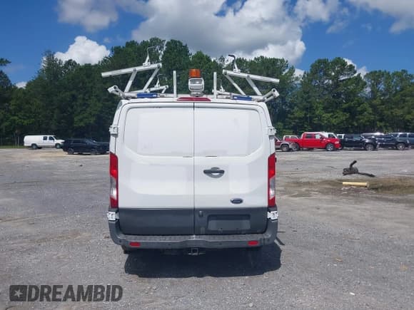 ✅ 2016 Ford Transit Cargo • VIN: 1FTYR1YM4GKB55185 • Lot: 42769357. Listed on IAAI with Not provided. Free auction sales archive from the USA and detailed vehicle history report at DreamBid. Image 16.