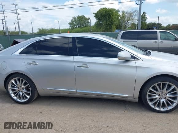 ✅ 2013 Cadillac XTS Platinum • VIN: 2G61U5S3XD9216059 • Lot: 43101311. Listed on IAAI with 161,082 mi. Free auction sales archive from the USA and detailed vehicle history report at DreamBid. Image 13.