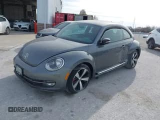 ✅ 2012 Volkswagen Beetle Turbo • VIN: 3VW467AT7CM623809 • Lot: 43741778. Wystawiony na IAAI z przebiegiem 74 679 mil. Bezpłatny archiwum sprzedaży aukcyjnych z USA i szczegółowy raport historii pojazdu na DreamBid. Zdjęcie 2.