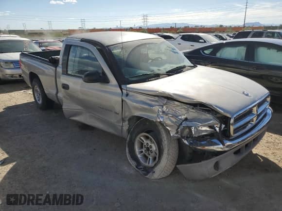 1998 Dodge Dakota SLT с VIN 1B7GL22XXWS651578, выставлен на аукционе Copart как лот 76149304 с пробегом 142 433 миль миль и Списание • Salvage title. История ставок и продаж доступна на DreamBid. Изображение 4.