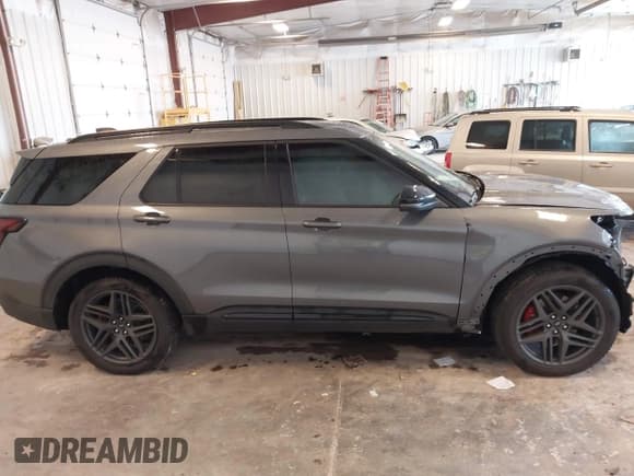 ✅ 2025 Ford Explorer ST • VIN: 1FMWK8GCXSGA03321 • Lot: 43095335. Listed on IAAI with 12,387 mi. Free auction sales archive from the USA and detailed vehicle history report at DreamBid. Image 13.