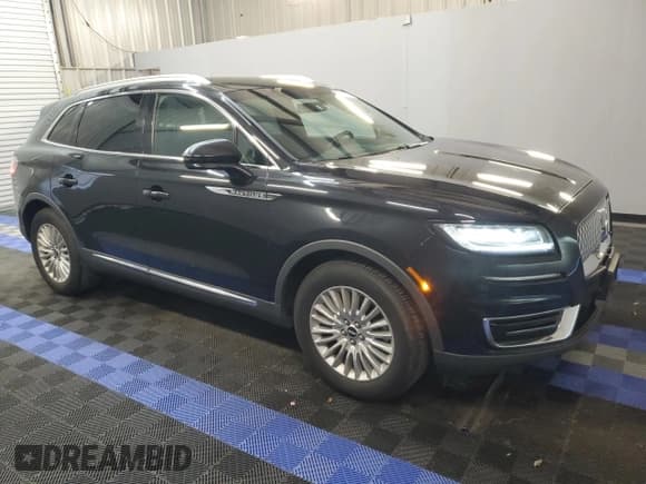 ✅ 2019 Lincoln Nautilus Standard • VIN: 2LMPJ6J99KBL48473 • Lot: 64984184. Listed on Copart with 90,575 mi. Free auction sales archive from the USA and detailed vehicle history report at DreamBid. Image 4.