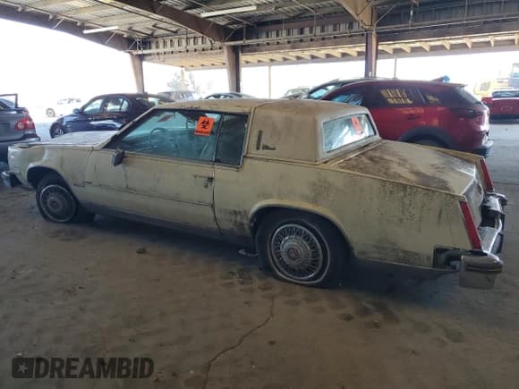 ✅ 1981 Cadillac Eldorado • VIN: 1G6AL5795BE647287 • Лот: 65919125. Опубликован ранее на Copart с пробегом Не указан. Бесплатный доступ к архиву аукционных продаж из США и подробный отчёт об истории автомобиля на DreamBid. Изображение 2.