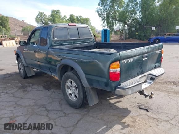 ✅ 2002 Toyota Tacoma PreRunner • VIN: 5TESM92N52Z143121 • Lot: 43663203. Listed on IAAI with 313,284 mi. Free auction sales archive from the USA and detailed vehicle history report at DreamBid. Image 3.