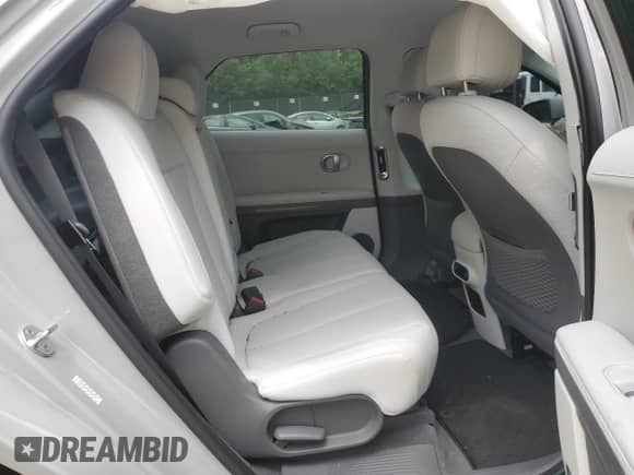 2022 Hyundai Ioniq 5 SEL z VIN KM8KNDAF9NU104759, wystawiony jako Copart lot #55657853 z przebiegiem 6 314 mil mil oraz . Historia ofert i sprzedaży dostępna na DreamBid. Obrazek 10.