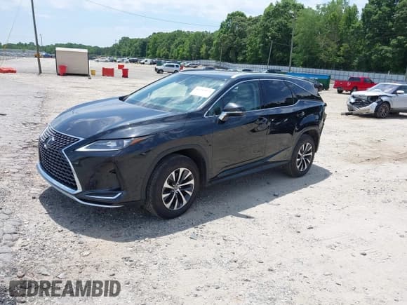 ✅ 2021 Lexus RX 350L • VIN: JTJHZKFA8M2034019 • Lot: 42243974. Listed on IAAI with 61,935 mi. Free auction sales archive from the USA and detailed vehicle history report at DreamBid. Image 2.