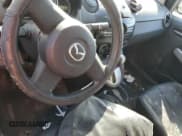 ✅ 2011 Mazda 2 Sport • VIN: JM1DE1HY5B0120205 • Лот: 71291954. Опубликован ранее на Copart с пробегом Не указан. Бесплатный доступ к архиву аукционных продаж из США и подробный отчёт об истории автомобиля на DreamBid. Изображение 8.