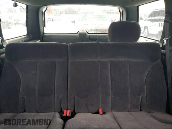 2001 Chevrolet Blazer LT z VIN 1GNDT13W91K239137, wystawiony jako Copart lot #88429655 z przebiegiem 163 132 mil mil oraz Szkoda całkowita • Salvage title. Historia ofert i sprzedaży dostępna na DreamBid. Obrazek 10.