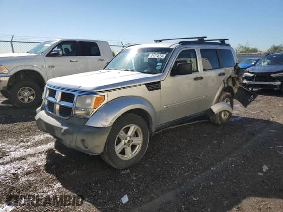 2007 Dodge Nitro SLT с VIN 1D8GU58K77W557115, выставлен на аукционе Copart как лот 81274294 с пробегом 152 529 миль миль и Списание • Salvage title. История ставок и продаж доступна на DreamBid. Изображение 1.