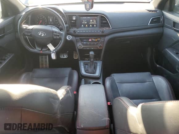 2018 Hyundai Elantra Sport с VIN KMHD04LBXJU511064, выставлен на аукционе Copart как лот 80541194 с пробегом 72 612 миль миль и Списание • Salvage title. История ставок и продаж доступна на DreamBid. Изображение 8.