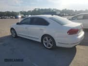 ✅ 2013 Volkswagen Passat SEL Premium • VIN: 1VWCN7A3XDC030348 • Lot: 66612395. Listed on Copart with 187,032 mi. Free auction sales archive from the USA and detailed vehicle history report at DreamBid. Image 2.