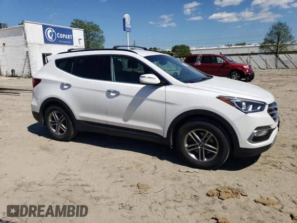 ✅ 2018 Hyundai Santa Fe 2.4L • VIN: 5NMZU3LB0JH060954 • Лот: 51750544. Опубликован ранее на Copart с пробегом 123 970 миль. Бесплатный доступ к архиву аукционных продаж из США и подробный отчёт об истории автомобиля на DreamBid. Изображение 4.