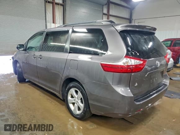 ✅ 2015 Toyota Sienna LE • VIN: 5TDKK3DCXFS594644 • Lot: 93735515. Listed on Copart with 106,597 mi. Free auction sales archive from the USA and detailed vehicle history report at DreamBid. Image 2.