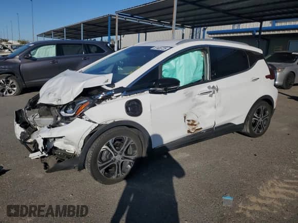 ✅ 2017 Chevrolet Bolt EV Premier • VIN: 1G1FX6S06H4143036 • Lot: 87405725. Listed on Copart with 82,027 mi. Free auction sales archive from the USA and detailed vehicle history report at DreamBid. Image 1.