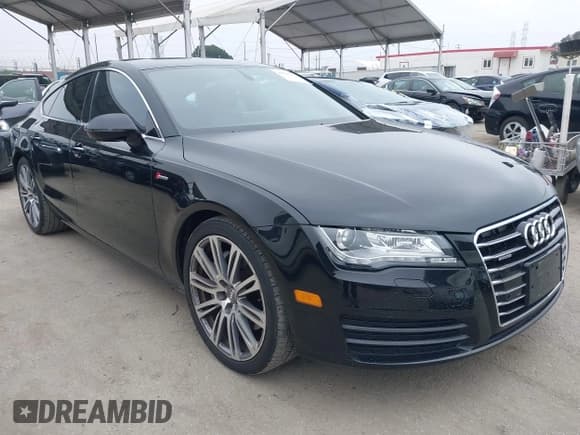 ✅ 2014 Audi A7 Premium Plus • VIN: WAUWGAFC9EN117113 • Lot: 42126257. Listed on IAAI with 91,838 mi. Free auction sales archive from the USA and detailed vehicle history report at DreamBid. Image 1.