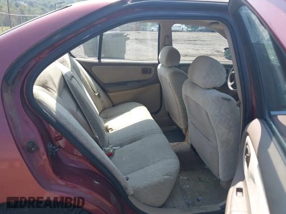 ✅ 2001 Nissan Altima GLE • VIN: 1N4DL01A21C124146 • Lot: 43014267. Listed on IAAI with 104,264 mi. Free auction sales archive from the USA and detailed vehicle history report at DreamBid. Image 8.