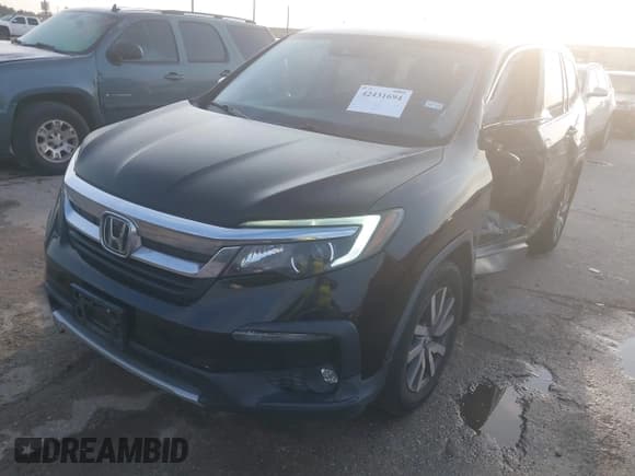 ✅ 2019 Honda Pilot EX-L • VIN: 5FNYF5H58KB043892 • Lot: 42431694. Listed on IAAI with 61,404 mi. Free auction sales archive from the USA and detailed vehicle history report at DreamBid. Image 2.