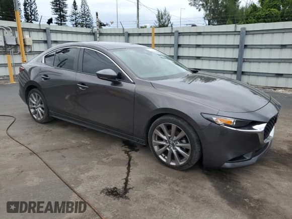 ✅ 2021 Mazda 3 Preferred • VIN: 3MZBPBCL6MM200094 • Lot: 81243655. Listed on Copart with 72,167 mi. Free auction sales archive from the USA and detailed vehicle history report at DreamBid. Image 4.