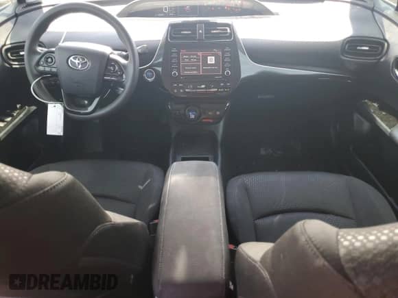 2021 Toyota Prius L Eco with VIN JTDKAMFU3M3148283, listed as a Copart auction lot 58578225 with 89,944 mi miles and Salvage title. Bid and sale history available at DreamBid. Image 8.