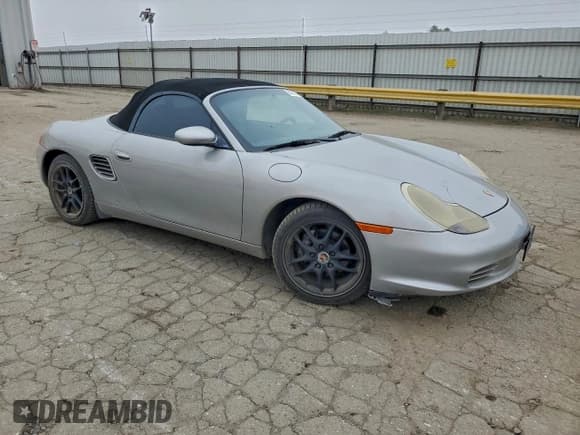 ✅ 2003 Porsche Boxster • VIN: WP0CA29803U620357 • Лот: 95801745. Опубликован ранее на Copart с пробегом 147 969 миль. Бесплатный доступ к архиву аукционных продаж из США и подробный отчёт об истории автомобиля на DreamBid. Изображение 4.