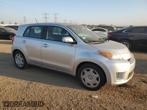 ✅ 2012 Scion xD • VIN: JTKKU4B42C1018656 • Lot: 84735535. Listed on Copart with 96,290 mi. Free auction sales archive from the USA and detailed vehicle history report at DreamBid. Image 4.