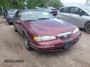 ✅ 1997 Mercury Cougar XR7 • VIN: 1MELM62W7VH617134 • Лот: 42536724. Опубликован ранее на IAAI с пробегом 145 849 миль. Бесплатный доступ к архиву аукционных продаж из США и подробный отчёт об истории автомобиля на DreamBid. Изображение 1.