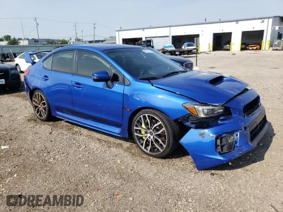 ✅ 2020 Subaru WRX STI • VIN: JF1VA2E69L9833328 • Lot: 66268315. Listed on Copart with 87,060 mi. Free auction sales archive from the USA and detailed vehicle history report at DreamBid. Image 4.