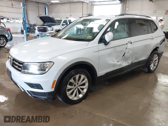 ✅ 2018 Volkswagen Tiguan S • VIN: 3VV0B7AX5JM108371 • Lot: 43047823. Listed on IAAI with 80,531 mi. Free auction sales archive from the USA and detailed vehicle history report at DreamBid. Image 2.