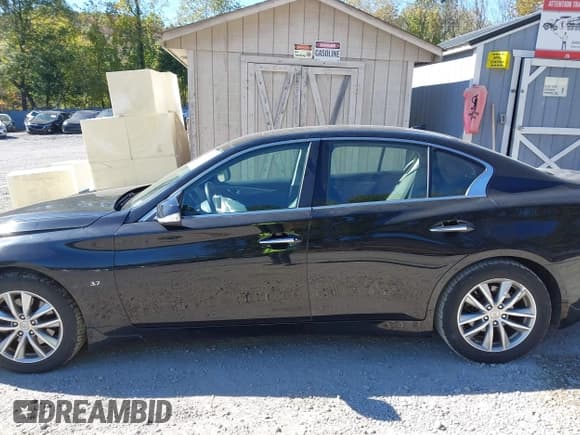 ✅ 2015 Infiniti Q50 Premium • VIN: JN1BV7AR6FM408877 • Lot: 43470572. Listed on IAAI with 68,040 mi. Free auction sales archive from the USA and detailed vehicle history report at DreamBid. Image 14.