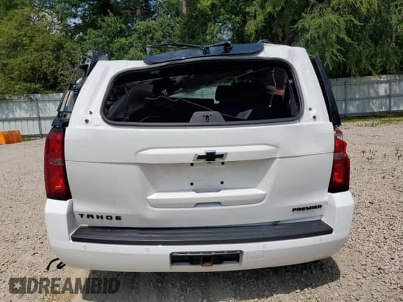 2019 Chevrolet Tahoe Premier z VIN 1GNSKCKJ9KR210595, wystawiony jako Copart lot #61662255 z przebiegiem 39 070 mil mil oraz Szkoda całkowita • Salvage title. Historia ofert i sprzedaży dostępna na DreamBid. Obrazek 6.