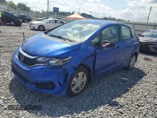 ✅ 2018 Honda Fit LX • VIN: 3HGGK5H40JM725014 • Лот: 71549475. Опубликован ранее на Copart с пробегом 105 079 миль. Бесплатный доступ к архиву аукционных продаж из США и подробный отчёт об истории автомобиля на DreamBid. Изображение 1.
