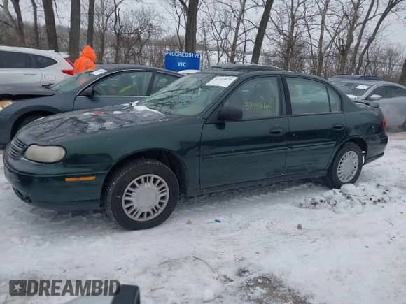 2003 Chevrolet Malibu z VIN 1G1ND52J13M571127, wystawiony jako IAAI lot #41310875 z przebiegiem 137 851 mil mil oraz . Historia ofert i sprzedaży dostępna na DreamBid. Obrazek 14.