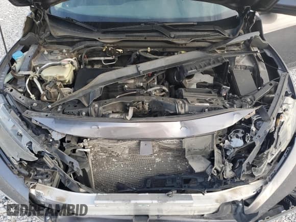 ✅ 2019 Honda Civic LX • VIN: 19XFC2F65KE022434 • Lot: 71771245. Wystawiony na Copart z przebiegiem 67 177 mil. Bezpłatny archiwum sprzedaży aukcyjnych z USA i szczegółowy raport historii pojazdu na DreamBid. Zdjęcie 11.