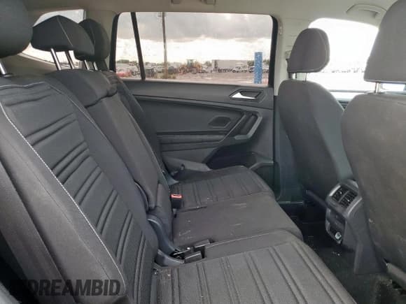 ✅ 2023 Volkswagen Tiguan S • VIN: 3VVRB7AX1PM077989 • Лот: 81515125. Опубликован ранее на Copart с пробегом 58 221 миль. Бесплатный доступ к архиву аукционных продаж из США и подробный отчёт об истории автомобиля на DreamBid. Изображение 11.