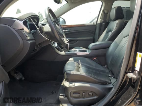 ✅ 2015 Cadillac SRX Premium Collection • VIN: 3GYFNGE3XFS573121 • Lot: 64599105. Wystawiony na Copart z przebiegiem 105 369 mil. Bezpłatny archiwum sprzedaży aukcyjnych z USA i szczegółowy raport historii pojazdu na DreamBid. Zdjęcie 7.