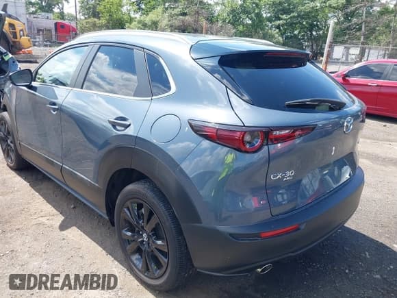 ✅ 2022 Mazda CX-30 S Carbon Edition • VIN: 3MVDMBCL9NM429826 • Lot: 42680808. Listed on IAAI with 28,234 mi. Free auction sales archive from the USA and detailed vehicle history report at DreamBid. Image 3.