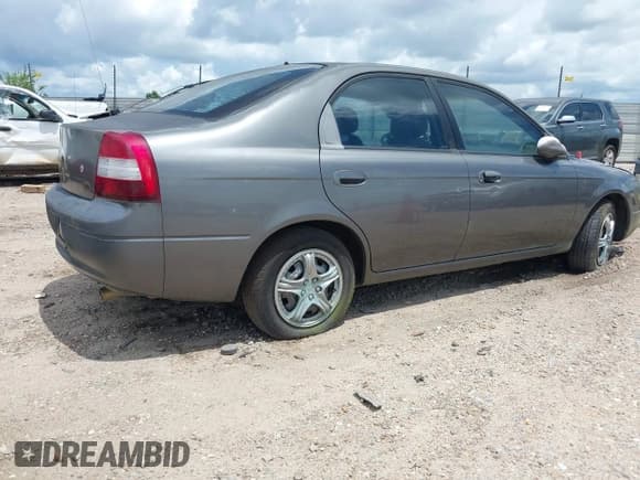 ✅ 2001 Kia Spectra GS • VIN: KNAFB161015032068 • Лот: 42474681. Опубликован ранее на IAAI с пробегом 177 465 миль. Бесплатный доступ к архиву аукционных продаж из США и подробный отчёт об истории автомобиля на DreamBid. Изображение 4.