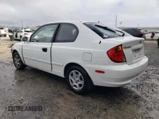 2004 Hyundai Accent GL with VIN KMHCG35C84U285750, listed as a Copart auction lot 85443094 with 167,169 mi miles and Salvage title. Bid and sale history available at DreamBid. Image 2.
