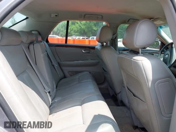 ✅ 2007 Cadillac DTS Luxury I • VIN: 1G6KD57Y37U116319 • Lot: 42401901. Listed on IAAI with 109,737 mi. Free auction sales archive from the USA and detailed vehicle history report at DreamBid. Image 8.