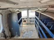 ✅ 2012 Ford Econoline Cargo Commercial • VIN: 1FTNE1EW2CDA97029 • Lot: 65733765. Wystawiony na Copart z przebiegiem 208 793 mil. Bezpłatny archiwum sprzedaży aukcyjnych z USA i szczegółowy raport historii pojazdu na DreamBid. Zdjęcie 10.