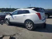 ✅ 2016 Cadillac SRX Premium Collection • VIN: 3GYFNDE3XGS517423 • Lot: 70914805. Listed on Copart with 164,008 mi. Free auction sales archive from the USA and detailed vehicle history report at DreamBid. Image 2.