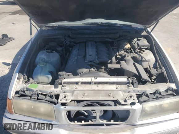 1998 BMW 3 Series 328i z VIN WBACD4326WAV64466, wystawiony jako Copart lot #74957534 z przebiegiem 152 963 mil mil oraz Szkoda całkowita • Salvage title. Historia ofert i sprzedaży dostępna na DreamBid. Obrazek 11.