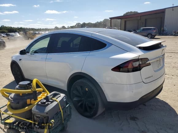 ✅ 2019 Tesla Model X 75D • VIN: 5YJXCAE24KF151420 • Lot: 82215815. Listed on Copart with 99,594 mi. Free auction sales archive from the USA and detailed vehicle history report at DreamBid. Image 2.