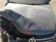 2013 Volkswagen Tiguan SE z VIN WVGAV7AX7DW018388, wystawiony jako Copart lot #56188045 z przebiegiem 98 066 mil mil oraz Szkoda całkowita • Salvage title. Historia ofert i sprzedaży dostępna na DreamBid. Obrazek 11.