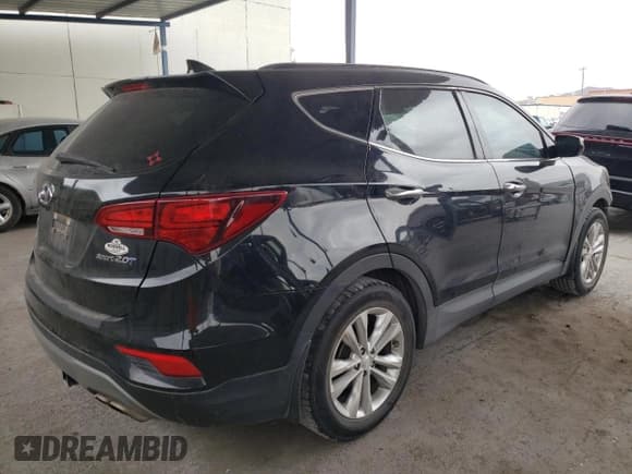 ✅ 2018 Hyundai Santa Fe 2.0T • VIN: 5NMZU4LA2JH075999 • Лот: 39291514. Опубликован ранее на Copart с пробегом 51 132 миль. Бесплатный доступ к архиву аукционных продаж из США и подробный отчёт об истории автомобиля на DreamBid. Изображение 3.