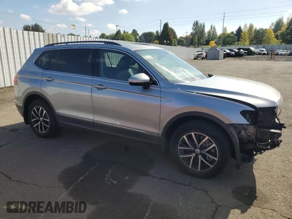 ✅ 2021 Volkswagen Tiguan SE • VIN: 3VV2B7AX1MM105285 • Lot: 81922955. Listed on Copart with 31,751 mi. Free auction sales archive from the USA and detailed vehicle history report at DreamBid. Image 4.