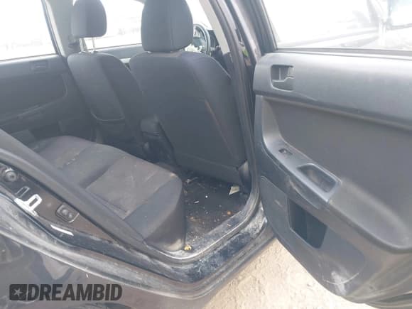 ✅ 2009 Mitsubishi Lancer ES • VIN: JA3AU26U09U027539 • Lot: 42804319. Wystawiony na IAAI z przebiegiem 187 889 mil. Bezpłatny archiwum sprzedaży aukcyjnych z USA i szczegółowy raport historii pojazdu na DreamBid. Zdjęcie 8.