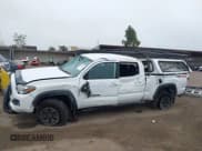 ✅ 2019 Toyota Tacoma SR5 • VIN: 3TMDZ5BN0KM069526 • Lot: 41911650. Listed on IAAI with 104,430 mi. Free auction sales archive from the USA and detailed vehicle history report at DreamBid. Image 14.